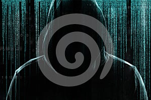 Silhouette of cyber criminal against background with digital symbols