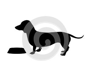 Silhouette of a dachshund with a bowl