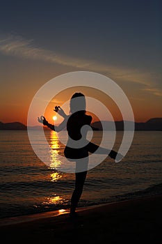 Silhouette of a dancer in the beach