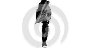 Silhouette Dancing man wearing a toreador costume. Isolated on white background in full length. Close up, slow motion.