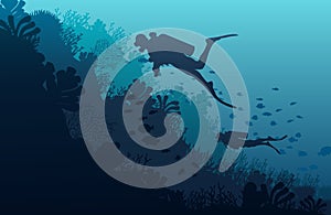 Silhouette of diver, coral reef and underwater