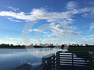 Silhouette of a dock on a lake