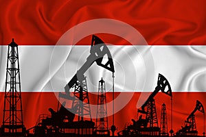 Silhouette of drilling rigs and oil derricks on the background of the flag of Austria. Oil and gas industry. The concept of oil