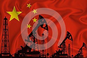 Silhouette of drilling rigs and oil derricks on the background of the flag of china. Oil and gas industry. The concept of oil