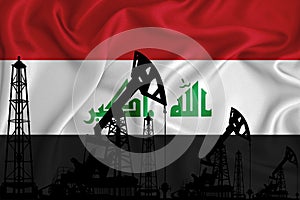 Silhouette of drilling rigs and oil derricks on the background of the flag of Iraq. Oil and gas industry. The concept of oil