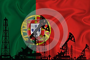 Silhouette of drilling rigs and oil derricks on the background of the flag of Portugal. Oil and gas industry. The concept of oil