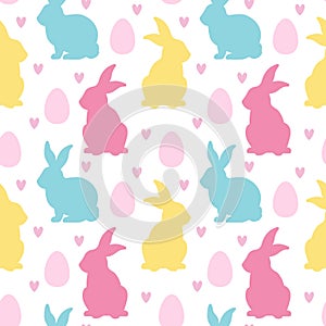 Silhouette Easter bunny,  egg, heart seamless pattern isolated on white background. Traditional symbol of Easter.