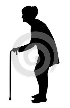 Silhouette of Elderly woman with bent back walking with cane