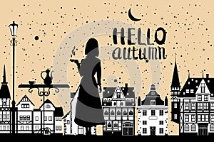 Silhouette elegant girl with cup of coffee, lettering Hello Autumn, cafe table, autumn, city houses. Vector illustration