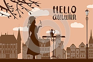 Silhouette elegant girl in hat with cup of coffee, lettering Hello Autumn, cafe table, tree, city houses. Vector