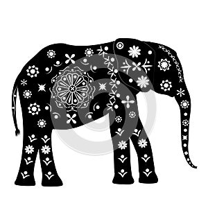 Silhouette of an elephant with patterns in ancient traditional s