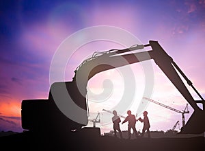 Silhouette engineer in a building site over Blurred constructio