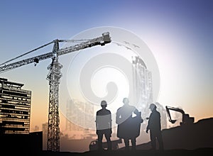 Silhouette engineer in a building site over Blurred constructio