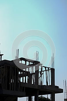 Silhouette of engineer and construction team working at site over blurred background for industry background with Light fair For