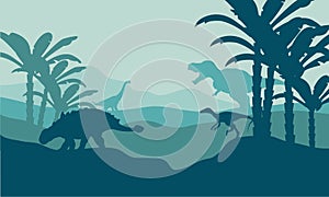 Silhouette of eoraptor and ankylosaurus