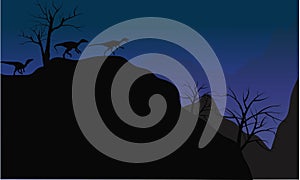 Silhouette of eoraptor in cliff