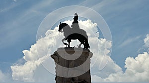 Silhouette of Equestrian statue of King John I in the Praca da Figueira square in Lisbon, Portugal