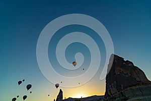 Silhouette of Fairy Chimneys and Hot Air Balloons in Cappadocia Turkey