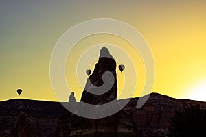 Silhouette of Fairy Chimneys and Hot Air Balloons in Cappadocia Turkey