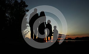 Silhouette of a family with children