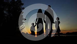 Silhouette of a family with children