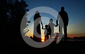 Silhouette of a family with children