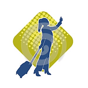 Silhouette of a fashionable female carrying a wheeled luggage travel bag. Silhouette of a business woman doing business trip