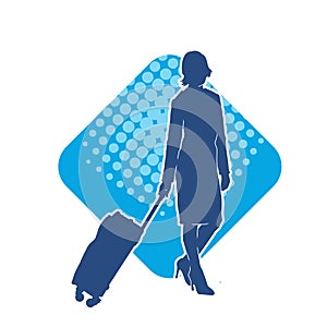 Silhouette of a fashionable female carrying a wheeled luggage travel bag. Silhouette of a business woman doing business trip
