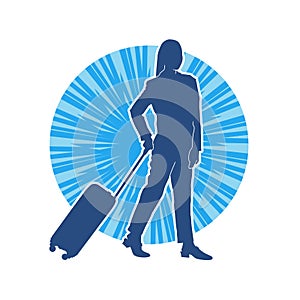 Silhouette of a fashionable female carrying a wheeled luggage travel bag. Silhouette of a business woman doing business trip