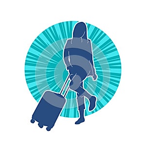 Silhouette of a fashionable female carrying a wheeled luggage travel bag. Silhouette of a business woman doing business trip