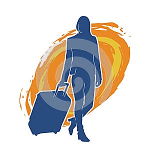 Silhouette of a fashionable female carrying a wheeled luggage travel bag. Silhouette of a business woman doing business trip