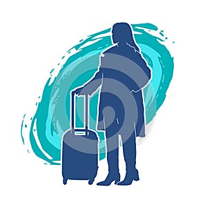Silhouette of a fashionable female carrying a wheeled luggage travel bag. Silhouette of a business woman doing business trip