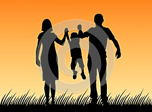 Silhouette of father and mother and son