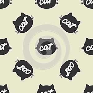 Silhouette of feline head with handwritten text Cat. Color seamless pattern.
