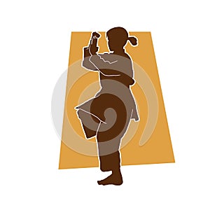 Silhouette of a female athlete kata karate vector