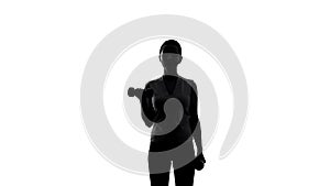 Silhouette of female athlete lifting dumbbells to lose weight, sport and workout