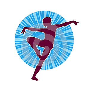 Silhouette of a female ballet dancer in action pose.