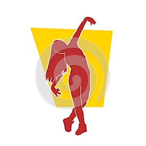 silhouette of a female dancer. silhouette of an aerobic move.