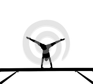 Silhouette of female gymnast on balance beam