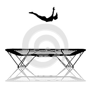 Silhouette of female gymnast on trampoline