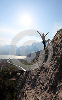 Silhouette of a female rock climber