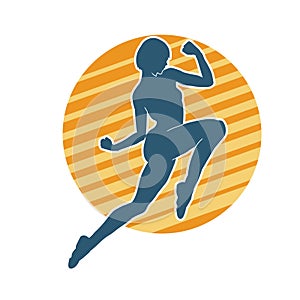 Silhouette of a female warrior jumps in action pose