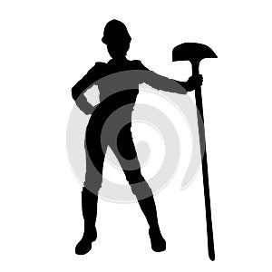 silhouette of a female worker standing pose with a shovel on her hand.