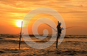 Silhouette of a fisherman at sunset, Unawatuna, Sri Lanka