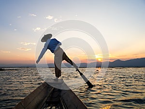 Silhouette fishermen in Inle Lake at sunrise, Shan State, Myanmar