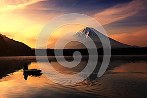 Silhouette fishing boat and Mt. Fuji at Shoji lake