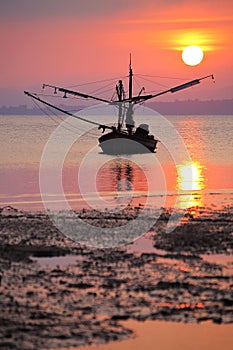 Silhouette of fishing boats on the sea