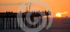 Silhouette of the fishing pier during sunrise near Virginia Beach, U.S.A