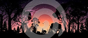 Silhouette forest with galaxy background