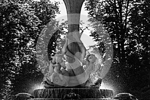 Silhouette of a fountain in the Retiro Park, Madrid